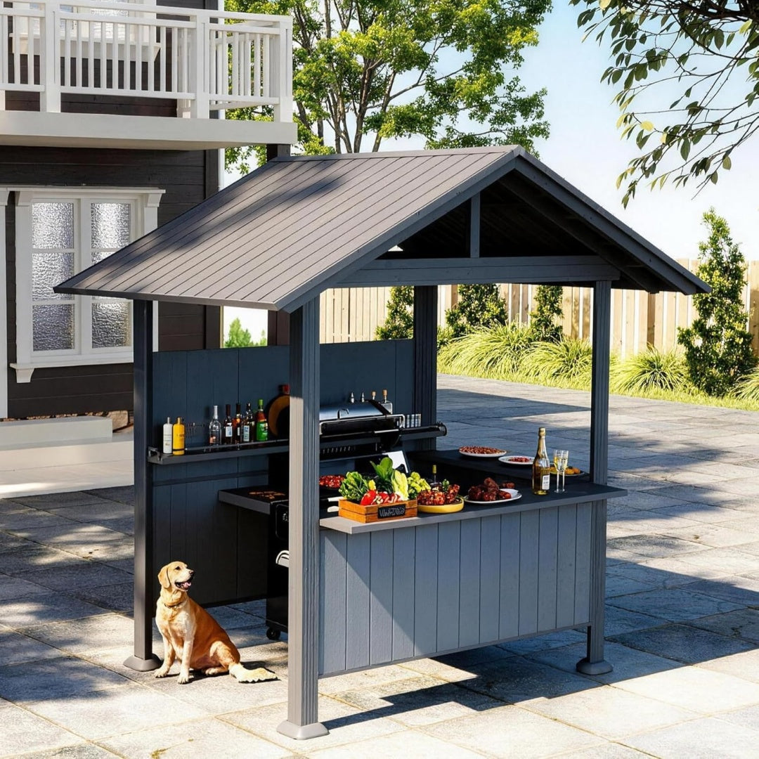 Grey gable-roof grill gazebo with storage shelves on a patio
