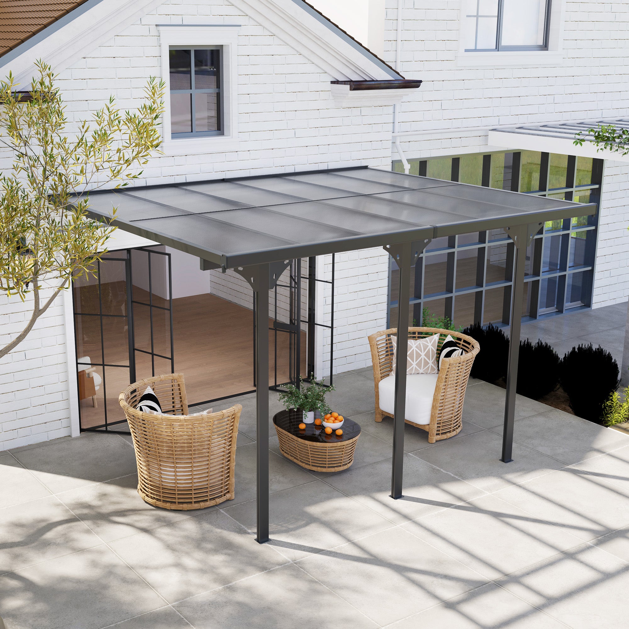 Grey aluminium pergola with transparent polycarbonate roof over a deck