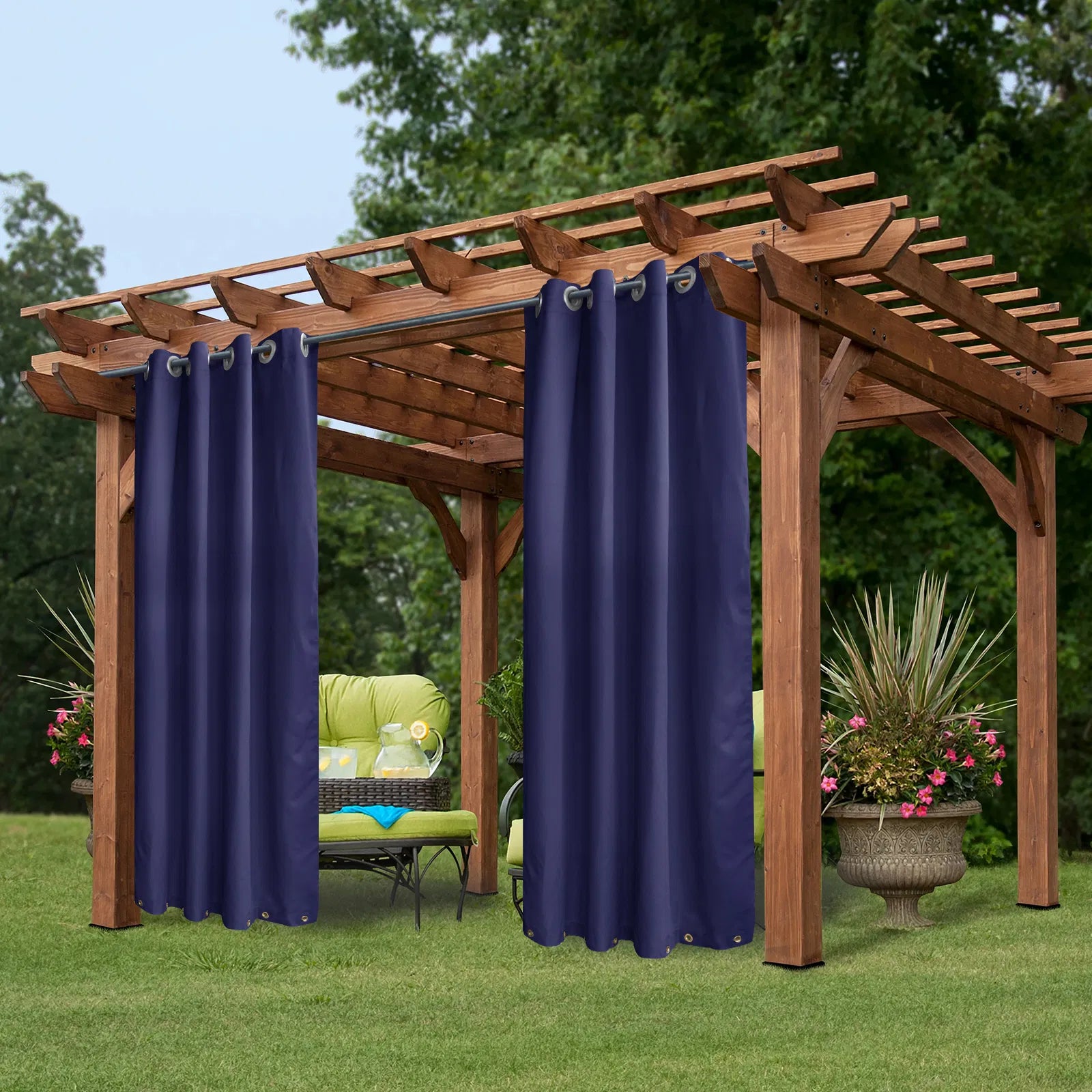 Navy waterproof outdoor curtain panel hanging on a porch