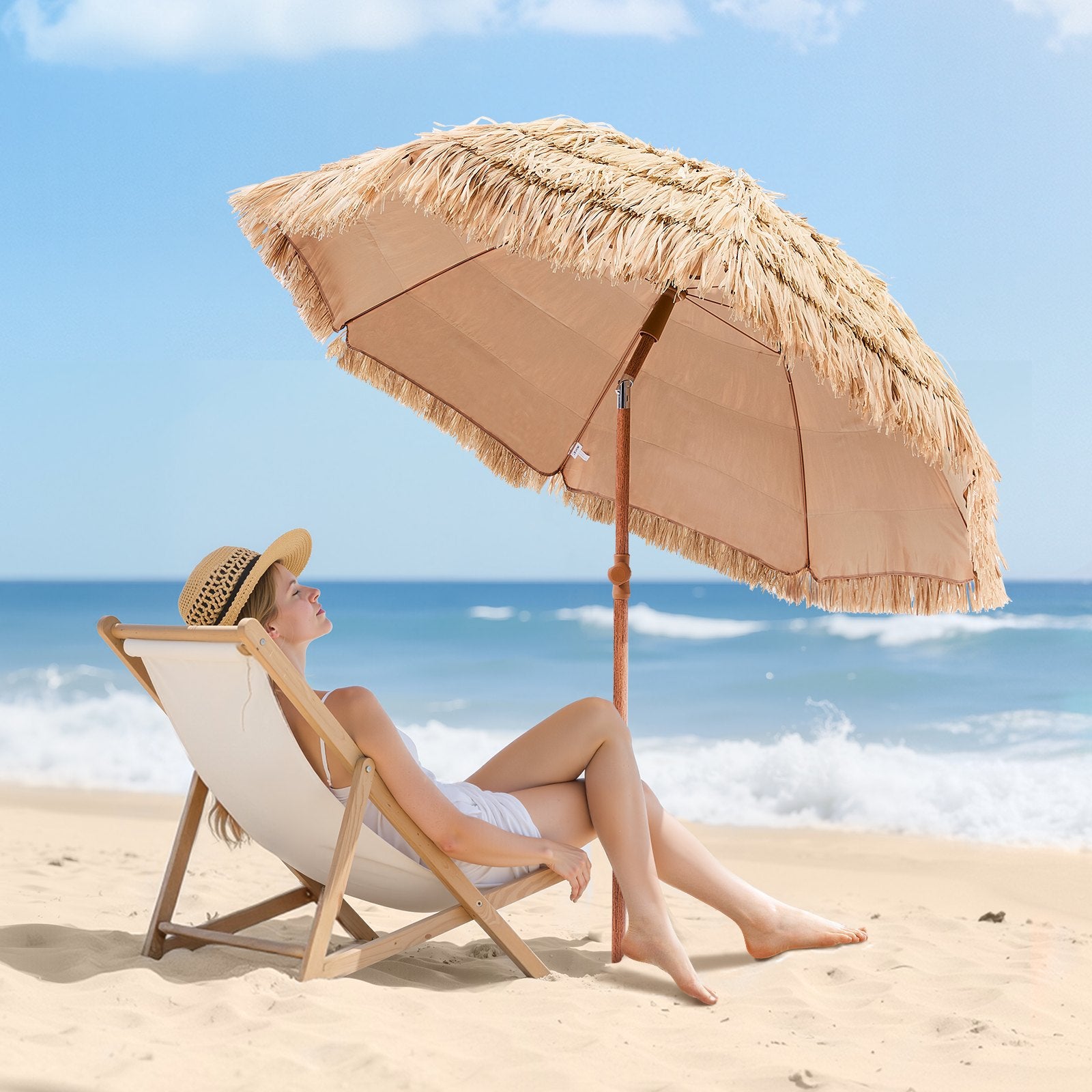 Thatched tiki umbrella beside a poolside seating area