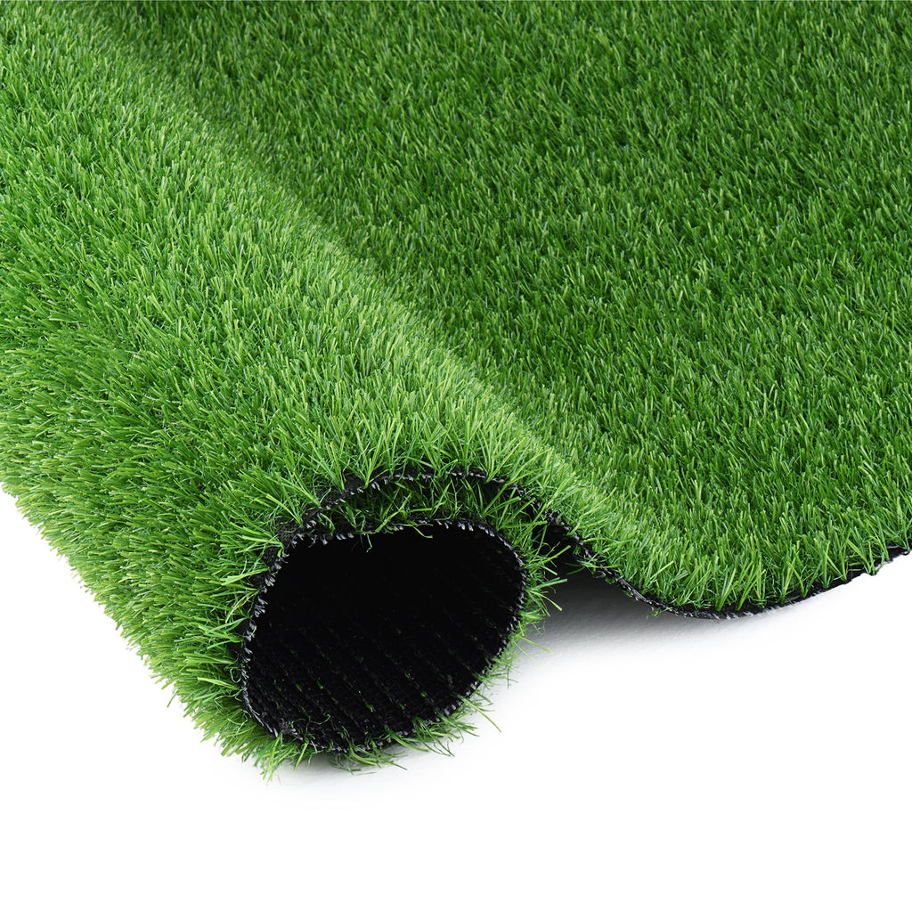 Artificial grass runner rug rolled out on a patio