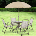Beige six-piece patio dining set with folding chairs and umbrella